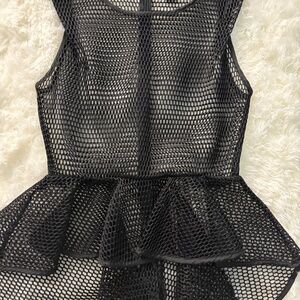 Peplum peekaboo fishnet top